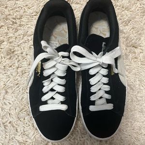 Black Puma sneakers